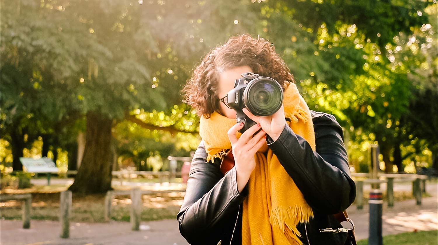 Magdalena as a wedding photographer, camera to her face